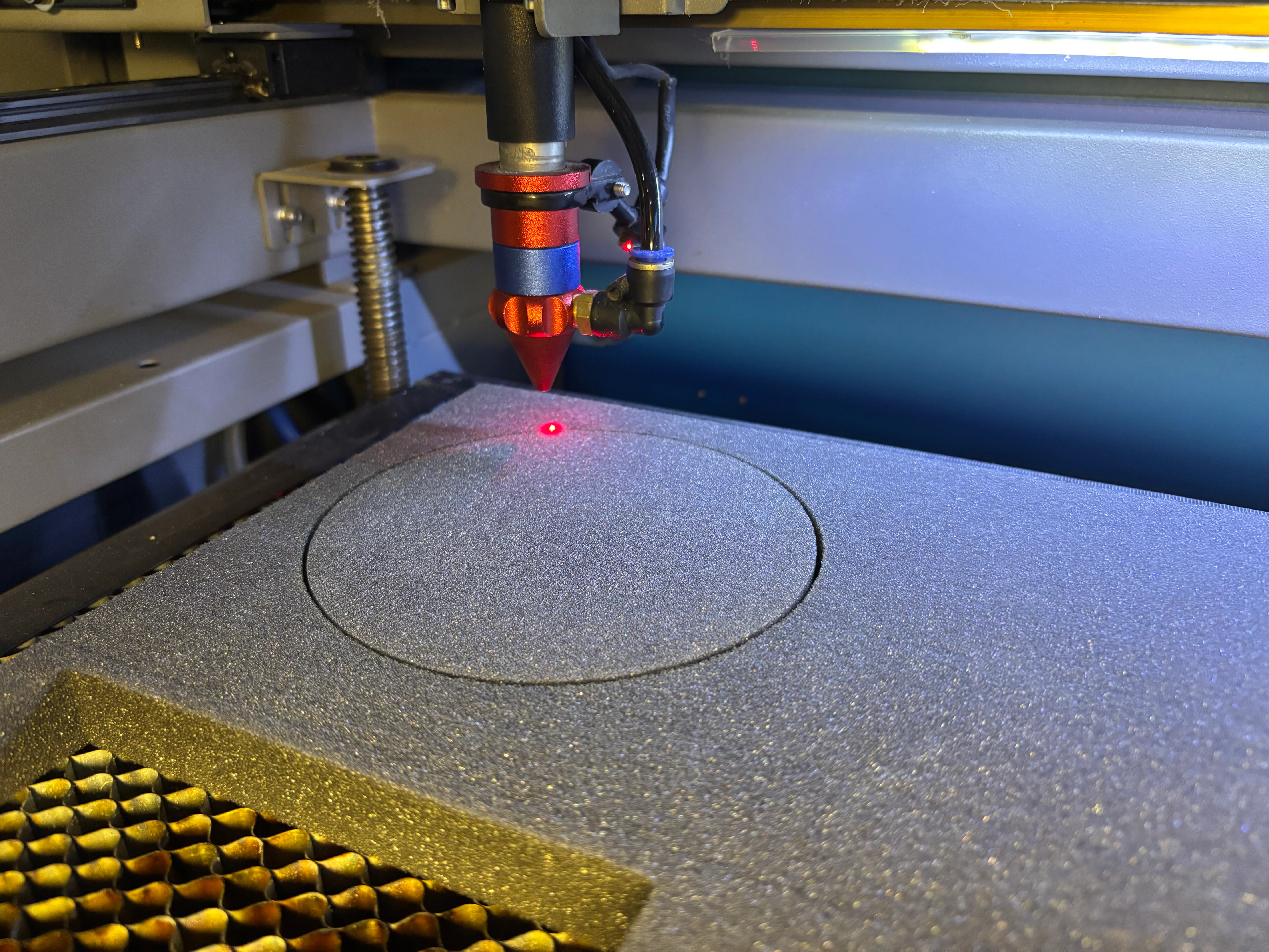 Custom branded metal display hardware fabricated for hospitality client